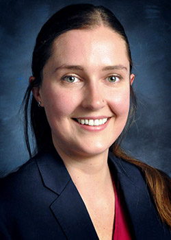 headshot of rachel swanteson franz, white woman with long brown hair