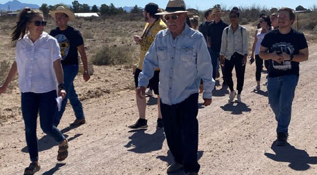 Photo of a group walking on a path in El Camino Real in Village of Doña Ana, NM